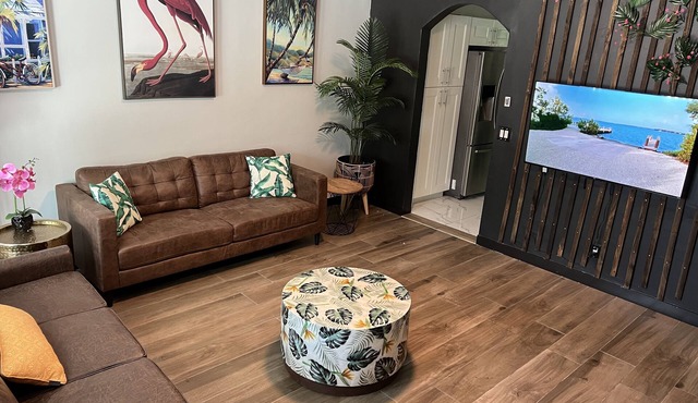Modern Vacation Home with pool- Conveniently located to Restaurants & Beach