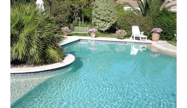 Modern villa with swimming pool and private garden,