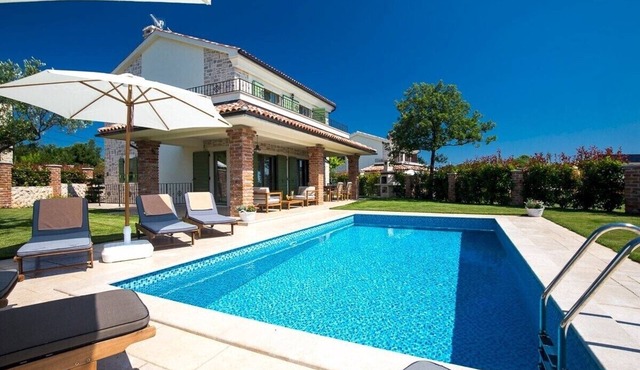 Modern Villa Nika* with a rustic touch and a pool on Krk