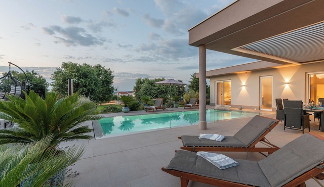 Modern villa Serena with pool,beautiful garden,quiet location,panoramic sea view