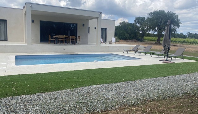 modern villa with heated swimming pool on the edge of vineyards