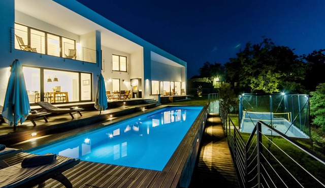 Modern villa with heated pool, whirlpool, volleyball court and mini football