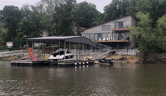 Modern waterfront home on Monkey Island with dock