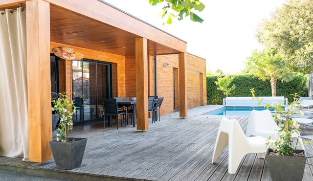 Modern wooden villa with heated pool