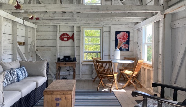 Modernized waterfront heritage homestead with entertainment barn