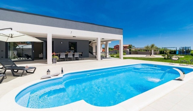 Modernly designed villa with private pool can accommodate up to 8 persons.