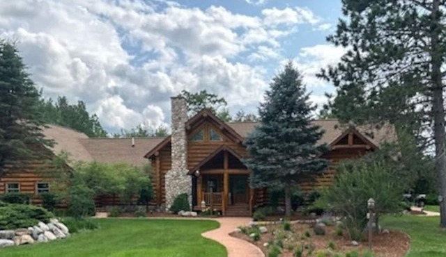Montana Built Log Cabin built just feet away from the North Branch of the AuSable River. Experience the 100 year old, untouched, cedar forest as well as the plentiful critters that reside there.