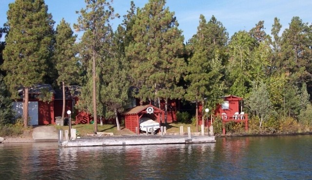 Moose Lodge Rustic Log Home Includes Two Boat Slip Dock with 2 guest cabins