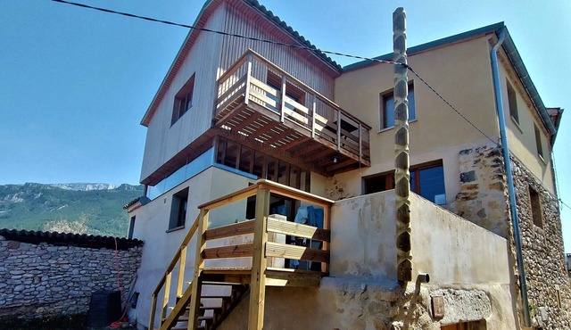 Mountain and river will treat you to the top of this medieval village.