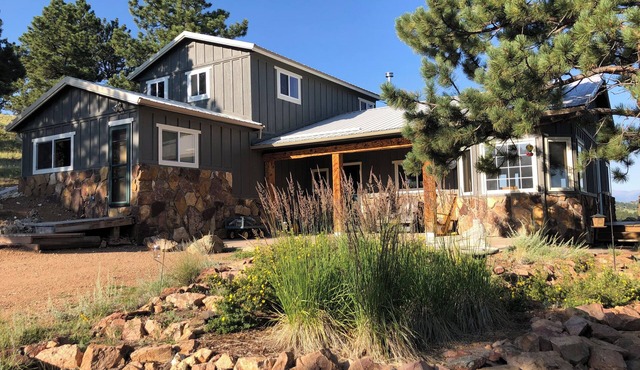 Mountain house overlooking Bear Basin Valley and the Sangre de Cristo Range.