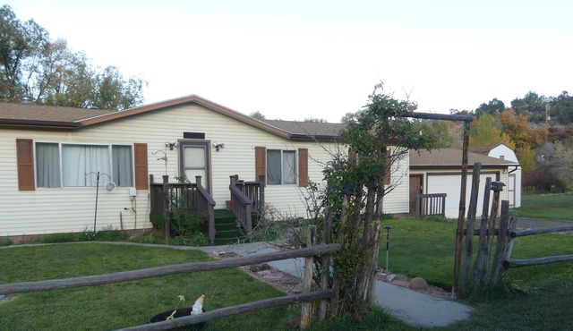Mountain Retreat 1.2 acres, secluded but with walking distance of town.