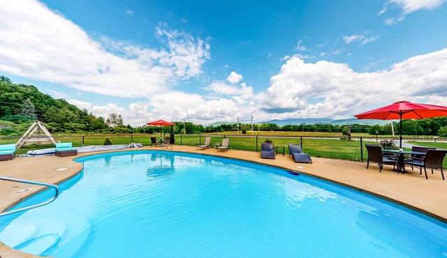 Mountain-view cabin with porch, firepit, fireplace, WiFi & seasonal pool