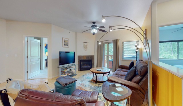 Mountain-view condo with private hot tub, fireplace, deck, W/D