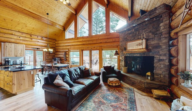 Mountain-view dog-friendly cabin with hot tub, wood stove, central AC, & W/D
