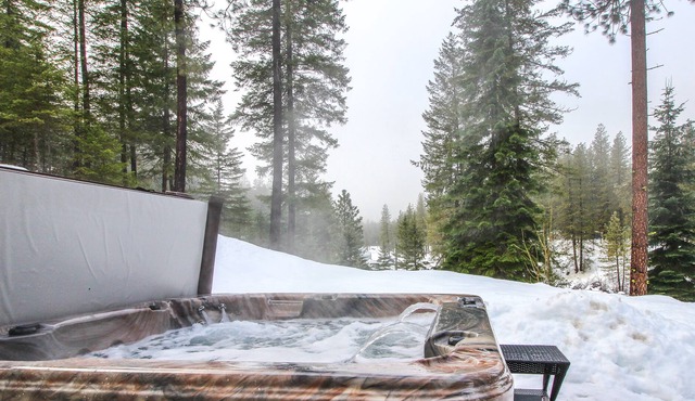 Mountain-view hideaway with hot tub, patio, deck, & outdoor firepit