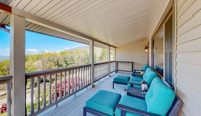 Mountain view home with a furnished deck, gas fireplace and washer/dryer