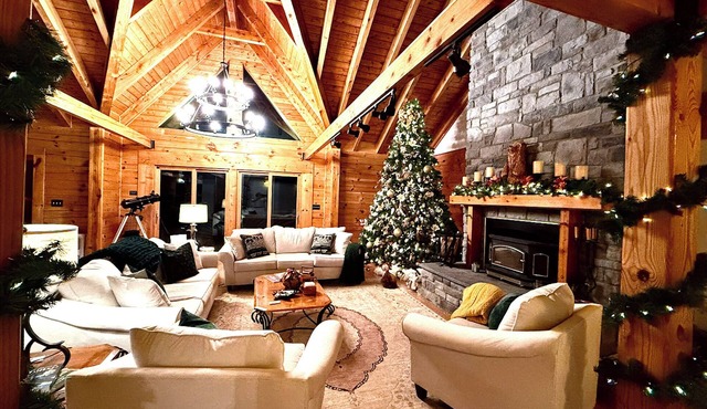 Mountaintop lodge, breathtaking views, private hiking trails & arcade game room.