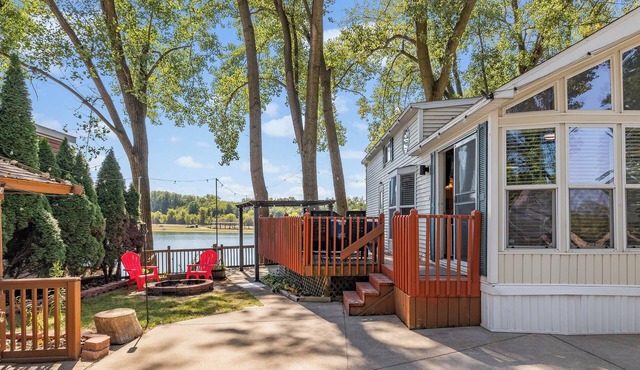 MTM Premier Funky Turtle sleeps 8 in a classic park model with beautiful lakefront views. Features lofted bedrooms, cozy living spaces, and access to campground activities for a fun and peaceful lakeside stay.
