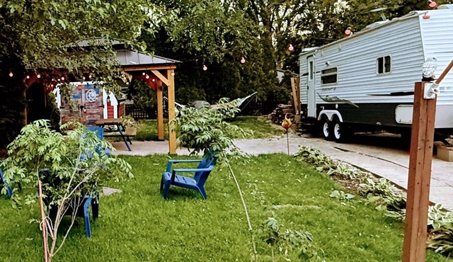 MTM Premier Funky Wizard sleeps 4 in a whimsical travel trailer. Includes a queen bedroom, full bathroom, kitchen, and outdoor space for a fun, family-friendly campground getaway, just minutes from Indiana Dunes.