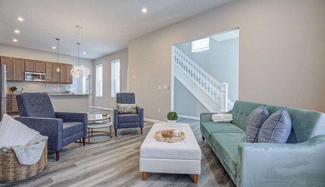 Musketeer Manor ~ 5 bedrooms & 4.5 baths off street parking & central location!