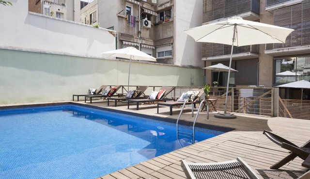 My Space Barcelona Apart. in a building with a shared swimming pool in Gracia