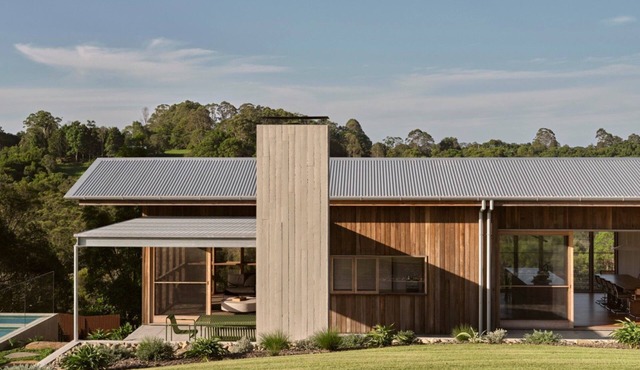 Myocum Ridge Farm - A winding driveway, cows, blue skies, manicured lawns, glittering pool