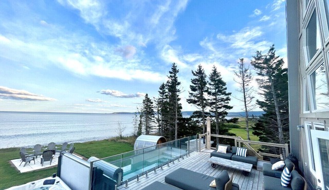 Mystical Beachfront Chalet , Hot tub , Sauna and Heated Container Pool