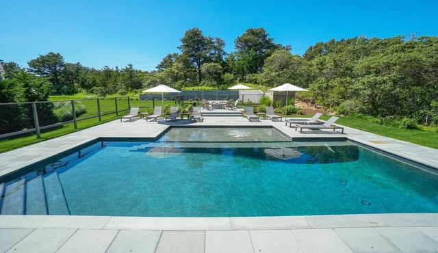 Nantucket family retreat with pool, basketball court, and bungalow