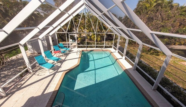 Naples Beach Escape | Pool, Canal Views & Tiki Vibes Near Pier & 5th Avenue