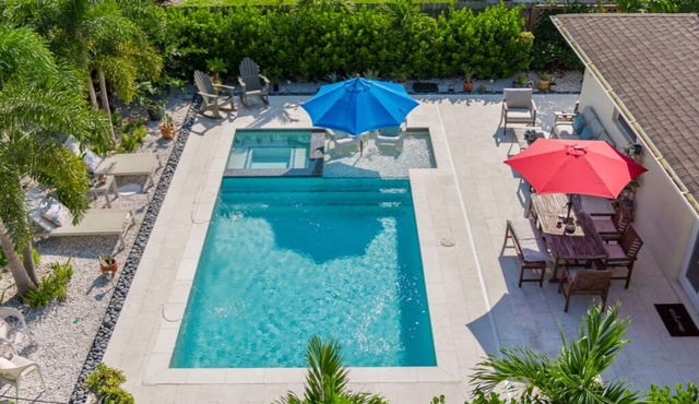 Naples Park Pool & Spa Home 1 Mile to Beach and Tropical Oasis Fenced Yard.