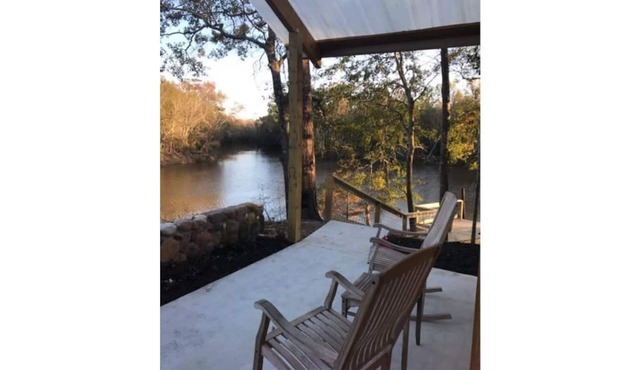 Naturalist Boudoir on POINT with Kayaks and SUP's