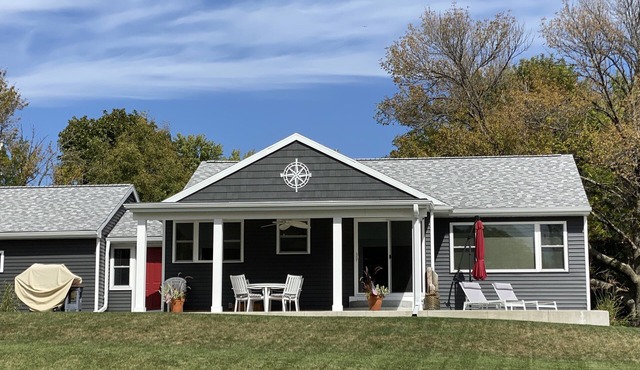 Nautical lakeview home with boat launch across the street from your rental home.