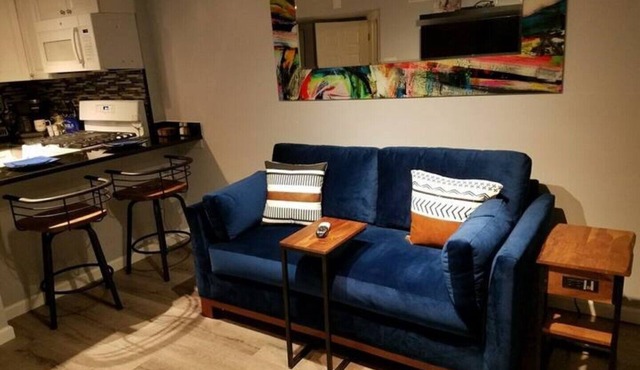 Nchanted 1BR Luxury Retreat near Airport and Sports Complex w/Yard and Parking