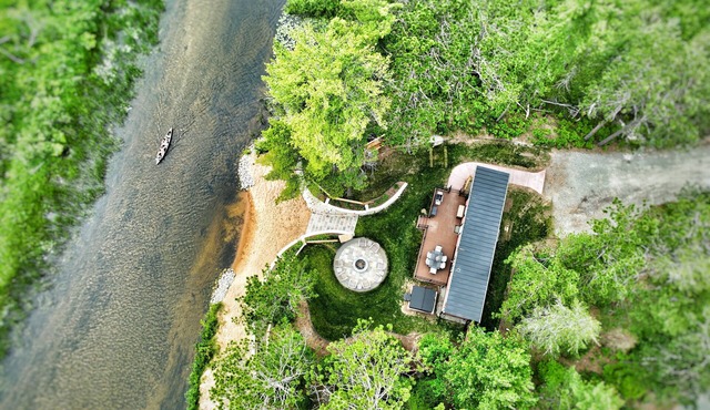 Near Pictured Rocks and trails, On the Au Train River, has private hot tub
