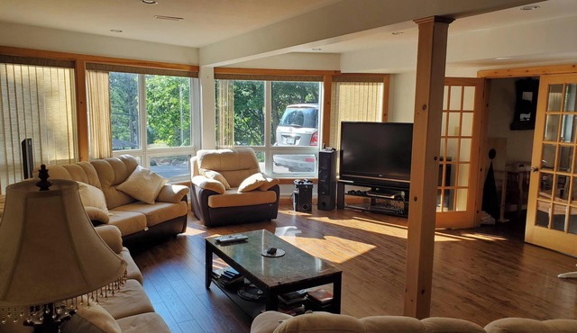 Near Sandy Beach, Comfy Cottage - Multi leveled Deck with Woodland Backdrop