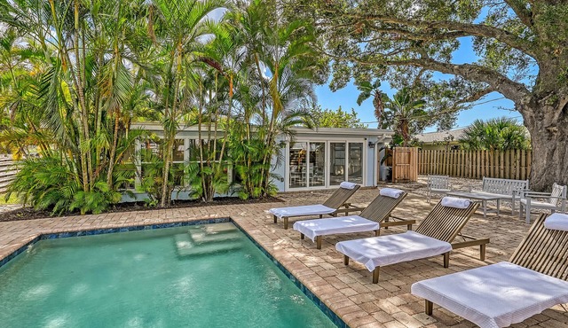 Near Siesta Key Beach, this Boho chic Sarasota pool home will feel like an oasis