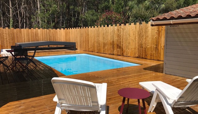 Near Soulac/mer 50M² air-conditioned chalet with private heated indoor pool