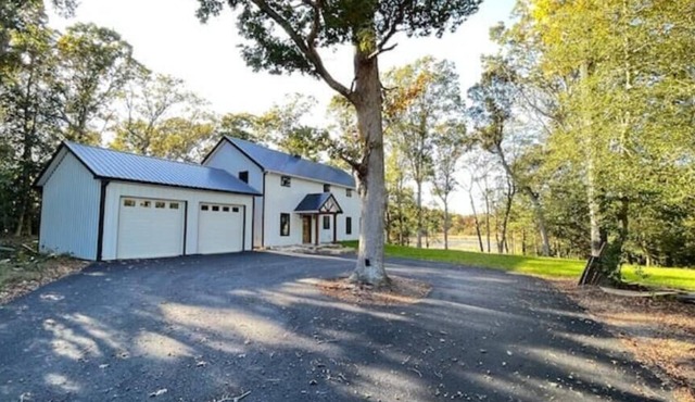 Near the beaches and the DE TURF, a newly built, secluded home with a water view