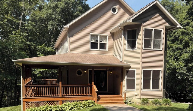 Nestled Among Majestic Trees, Hilltop Hideaway is a Woodland Sanctuary