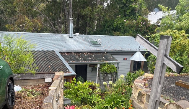 Nestled in the bush overlooking the river and 5 minutes to patrolled beach