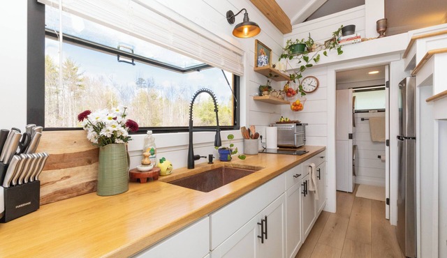 Nestled in the mountains, this cozy tiny home is 15 minutes to Asheville.