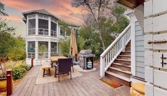 Nestled on a picket-fenced, private corner lot in prestigious Cape Fear Station