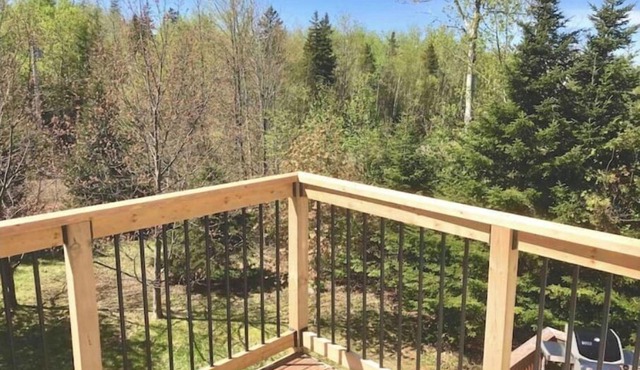 Nestled Woods by Brackley Beach