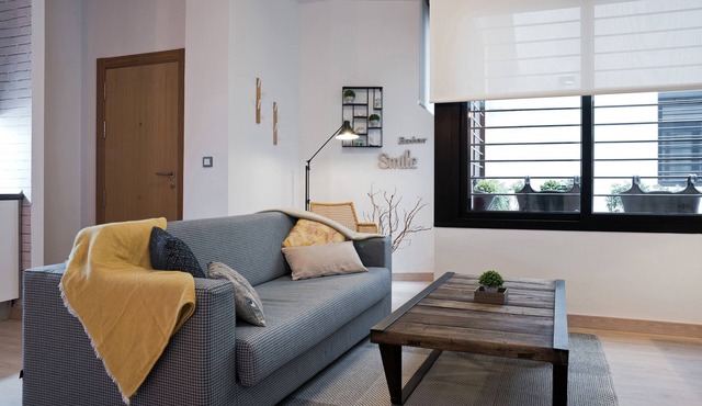 New 1-Bedroom Apt in Downtown Malaga with FREE Parking & Rooftop Pool
