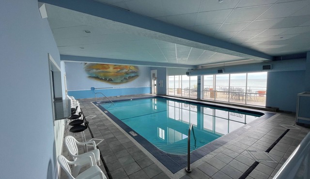 NEW 2-BR/2BA Lakefront Condo-private beach/indoor pool-rent 4 get 5th free -ask!