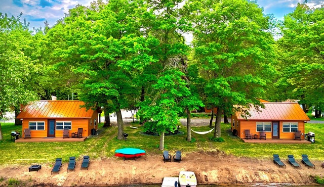 NEW 2 Cottages on the Lake Spooner WI Steps from sand of McKenzie Lake Sleeps 12