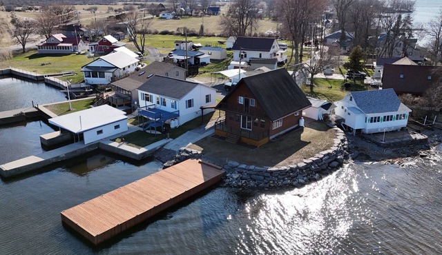 NEW 20’x60’ dock and 270 degree view of Guffin Bay and Adams Cove.