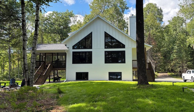 New 3-bedroom house on Spider Lake and Turtle River on a private 3 acre lot.