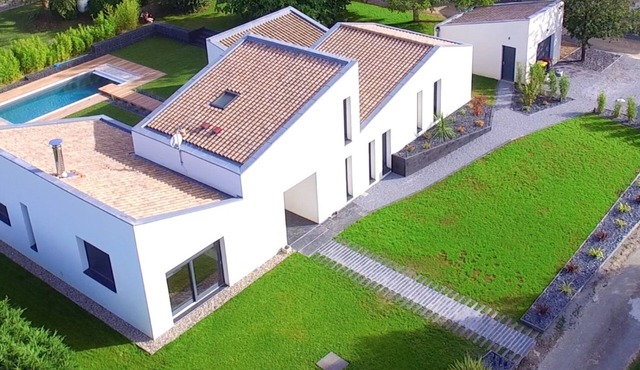 New all comfort design house with swimming pool in the middle of nature