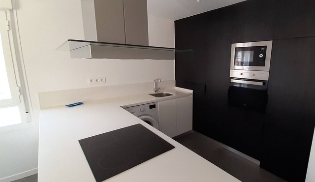 new apartment in a residential area with communal swimming pool / tennis court